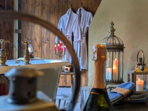 Champagne beside the private outdoor bath at Gablebach Cottage