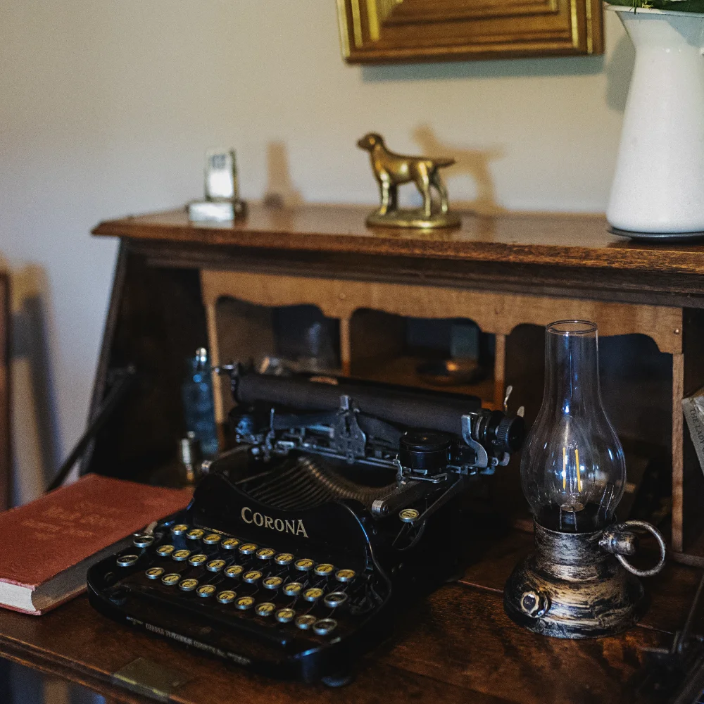Vintage typewriter set up for writing during a creative retreat